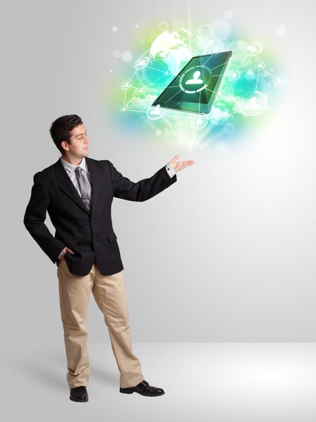 Business man showing modern green tablet technology concept