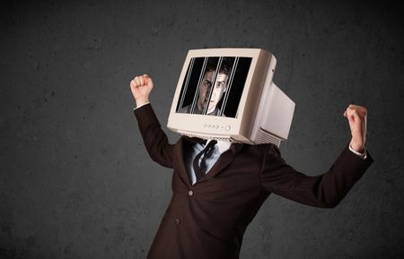 Business man with monitor screen on his head traped into a digital system concept