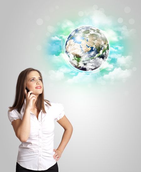 Young business woman with earth and cloud concept