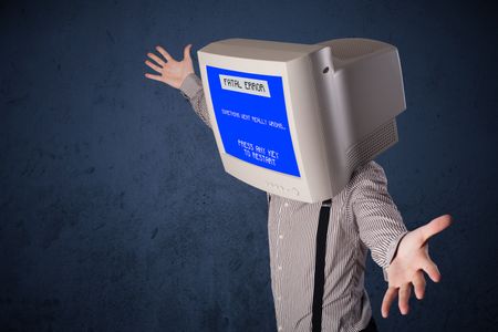 Person with a monitor head and fatal error blue screen on the display