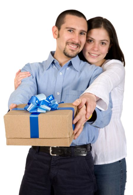 couple with a gift over a white background (shallow DOF, focus on gift)