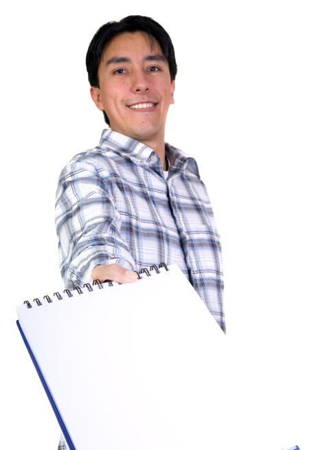 casual student offering notebook over a white background (shallow DOF)