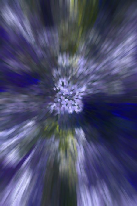 Abstract illustration of radial blur, with predominance of blue and green, for themes of perception and distortion and transition