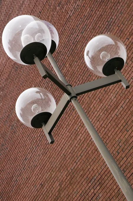 Light globes on post outside university center for performing arts
