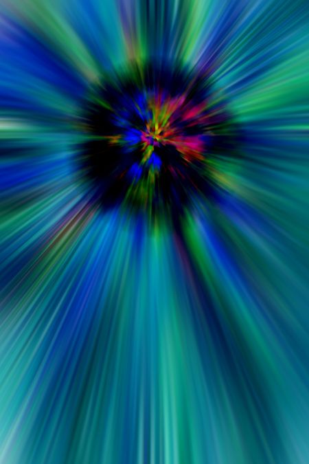 Abstract of a stellar explosion or black hole in a multicolored field with radial blur, for scientific and speculative themes
