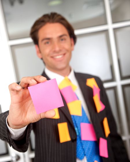 businessman cover with post its at an office