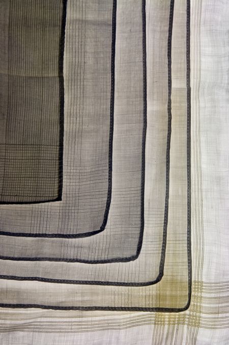 Pattern of men's handkerchiefs one on top of another