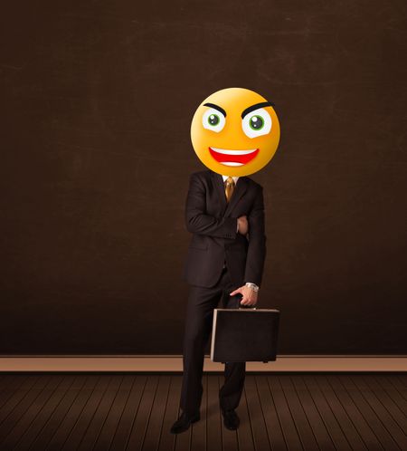 Funny businessman with yellow smiley face