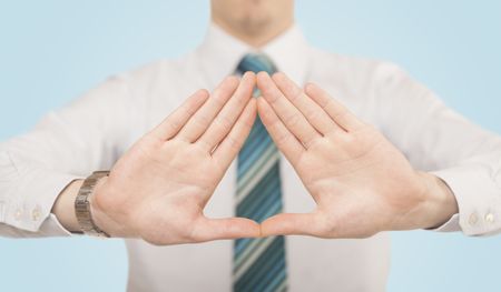 Close up of hands creating a form