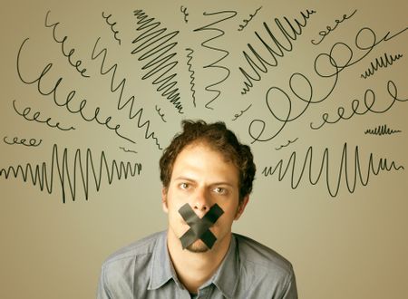 Young man with taped mouth and curly lines around his head  