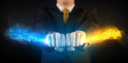 Man holding colorful glowing data in his hands concept