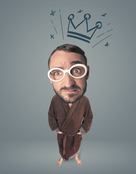 Funny guy with big head and drawn crown over it