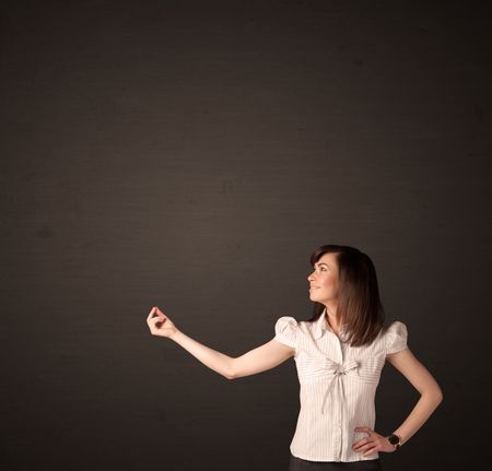 Businesswoman making gestures with her arms