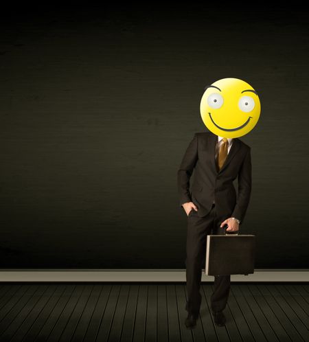 Funny businessman wears yellow smiley face