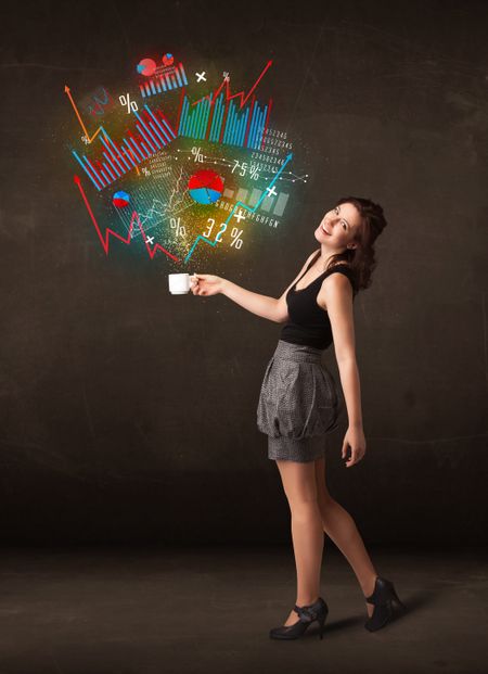 Businesswoman standing and holding a white cup with diagrams and graphs coming out of the cup