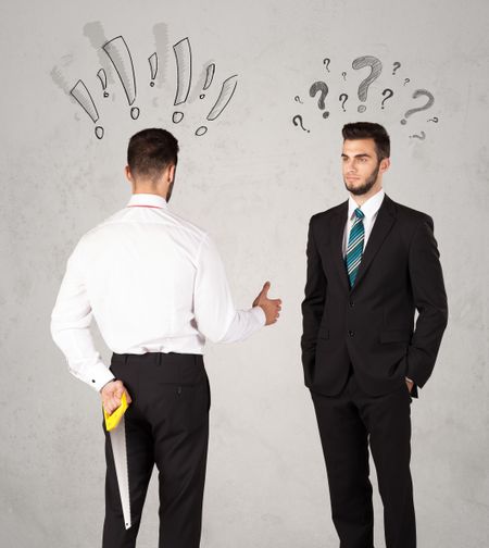 Ruthless businessman handshake with drawn exclamation and question marks around them head