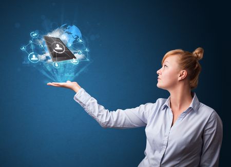 Young businesswoman holding cloud technology in her hand
