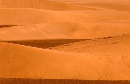 sand dunes at sunset in good orange colours