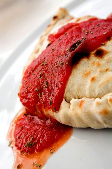 delicious italian dish - calzone on a plate