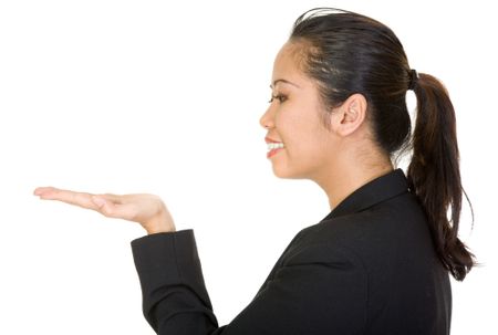 asian business woman holding something on her hand over a white background