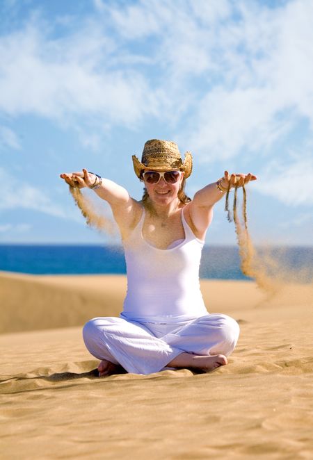 girl having fun at the beach in a very sunny day