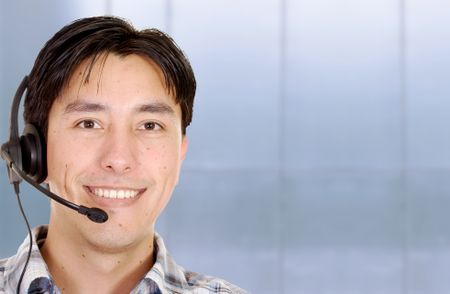 friendly customer service man smiling in an office environment