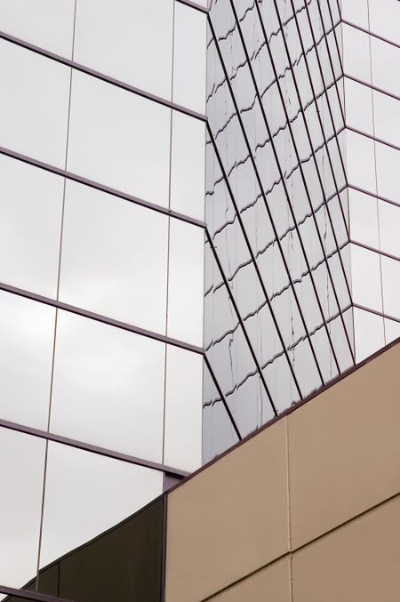 Office tower windows on a cloudy day