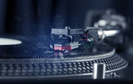 Turntable playing music with hand drawn cross lines concept on background