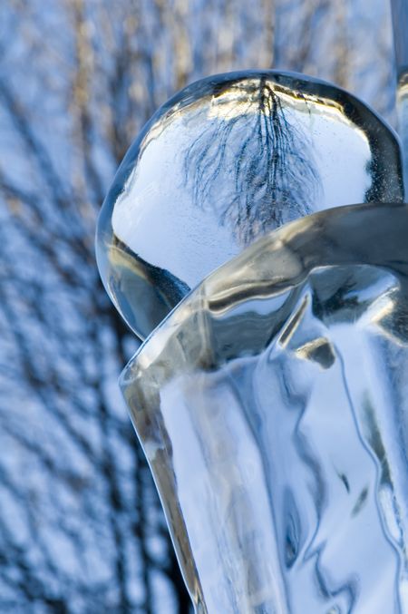 Close-up of ice pedestal and reflective ball