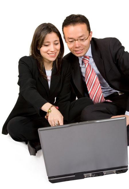 business couple with laptop smiling over a white background