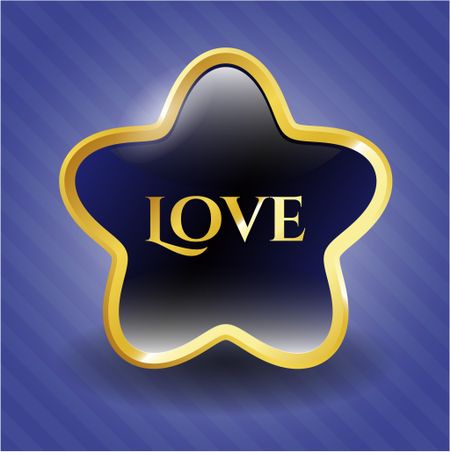 Gold shiny emblem with "love" text inside