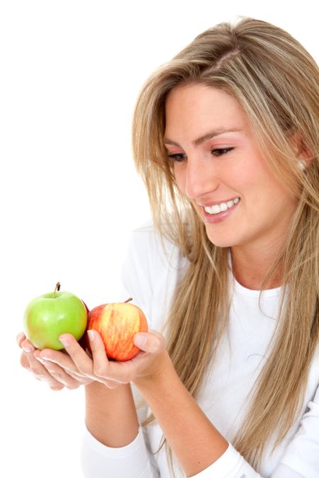 casual woman with apples over a white background