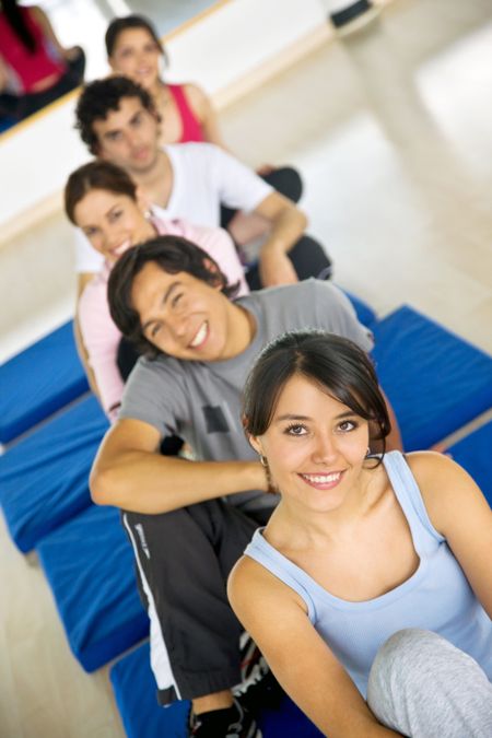 group of people at the gym smiling