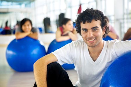 Handsome male at the gym smiling