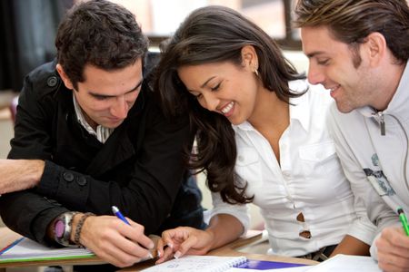 college or university students in a classroom studying