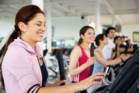 group-people-gym-doing-exercise-machines-26947534 group of people at the gym doing exercise on the machines
