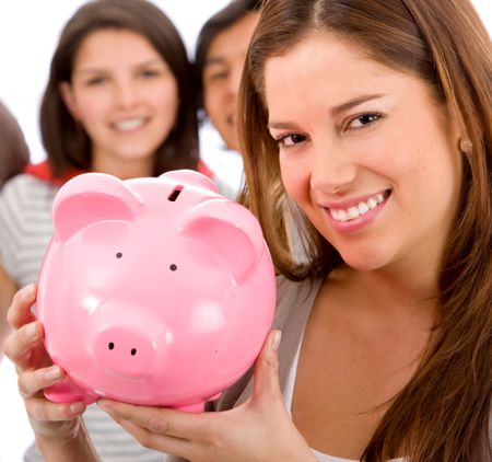 Casual woman holding a piggybank for savings