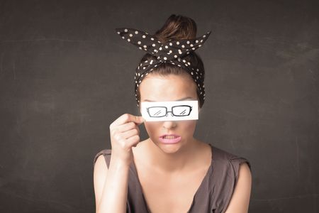 Happy girl looking with hand drawn eye glasses paper concept