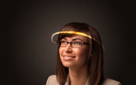 Pretty woman looking with futuristic high tech glasses concept