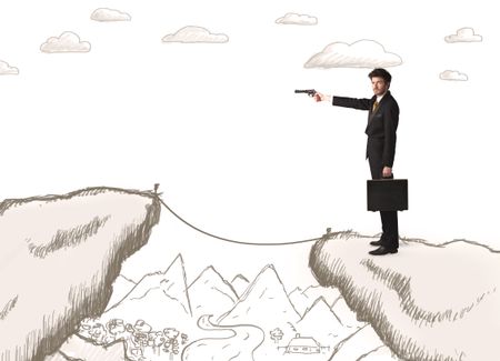 Businessman standing on the hand drawn edge of mountain 