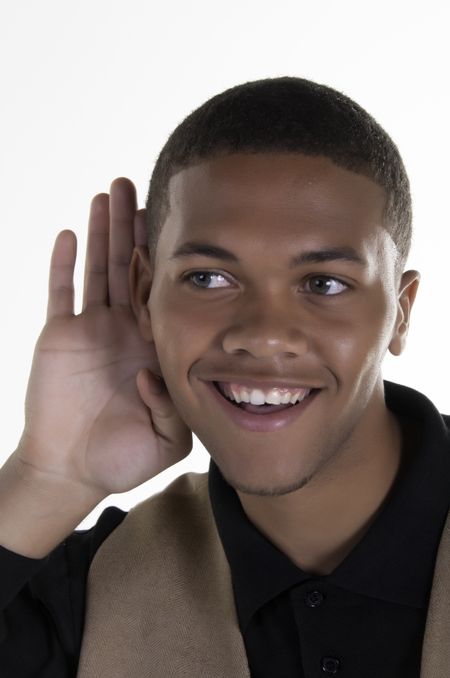 Smiling young black man listening closely