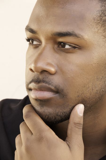 Thoughtful young black man