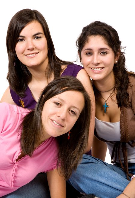 beautiful happy and young female friends smiling over a white background