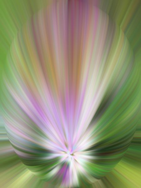 Multicolored abstract flower with inner glow, created with radial blur