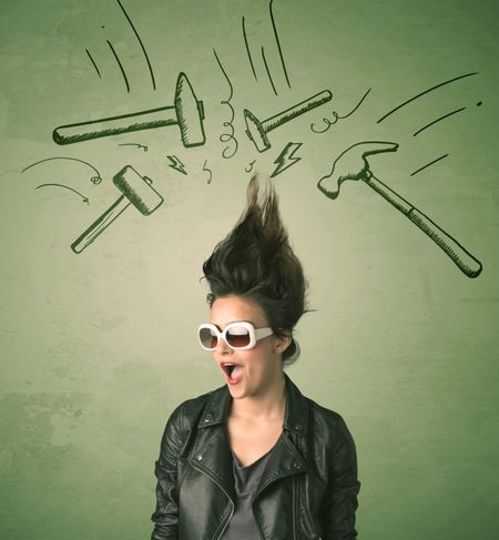 Tired woman with hair style and headache hammer symbols concept on background