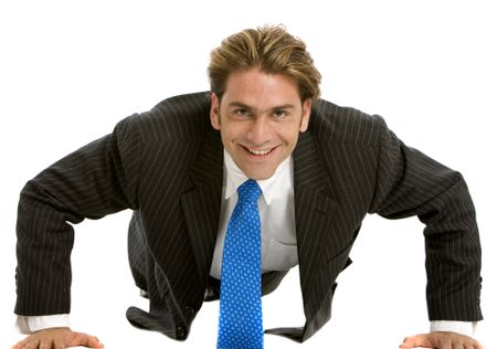Business man doing push-ups isolated over white