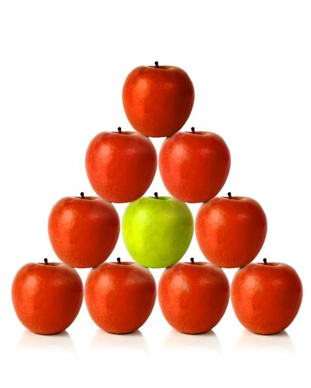 red apples on a pyramid shape over a white background