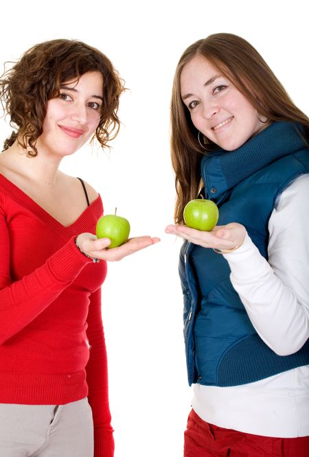 girls on a healthy diet holding green apples over a white background