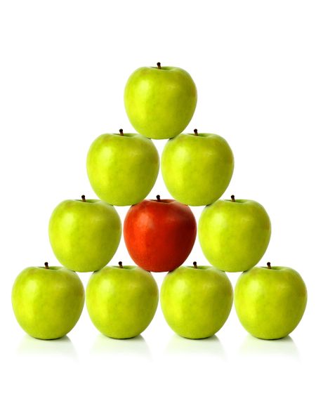 green apples on a pyramid shape over a white background