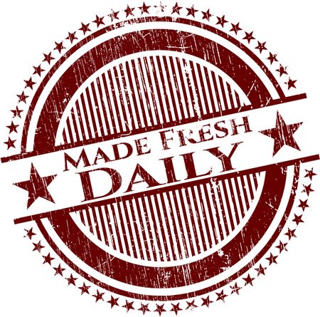 Red rubber stamp with text "made fresh daily"